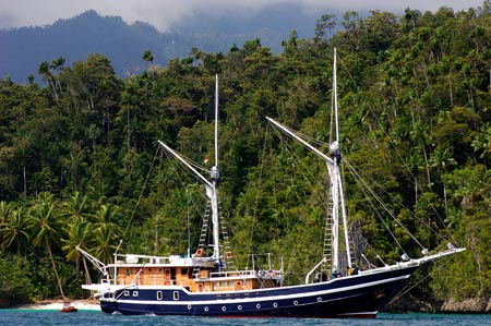 MSY Seahorse Liveaboard anchored at island in Indonesia
